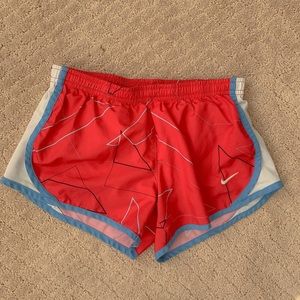 red nike shorts